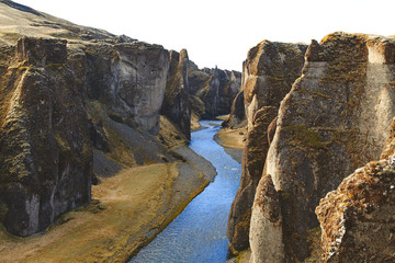 Fototapeta na wymiar Deep Fjadrargljufur canyon landscape and river in Iceland.