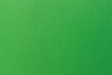 Green background of the wall.