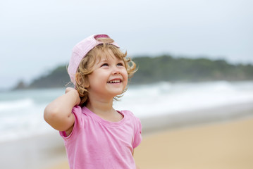girl in pink at th ebeach © Midkhat Izmaylov