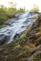 Naklejka na ściany i meble Klong Lan waterfall in rain forest of Thailand