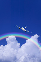 Fototapeta na wymiar Aeroplane Clouds And Rainbow
