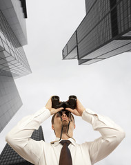 Businessman with binoculars