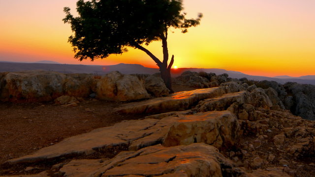 Panning shot of Sunset time-lapse from Mount Arbel near the Sea of Galilee.
