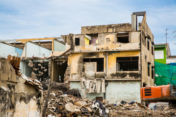 Fototapeta na wymiar Demolition of buildings destroyed