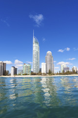 Fototapeta na wymiar Blue waves rolling on Surfers Paradise beach