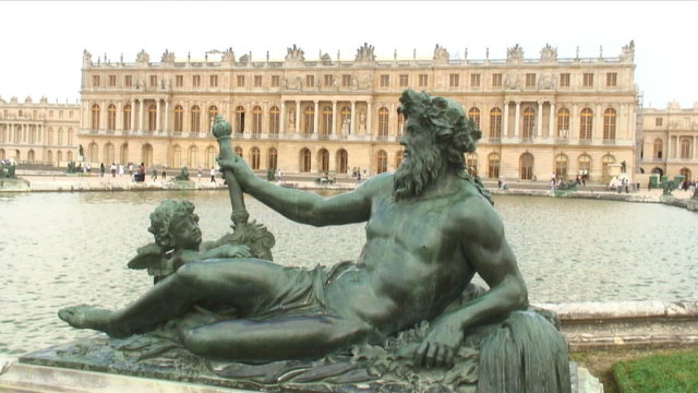 Statue at a pond in Versailles France.