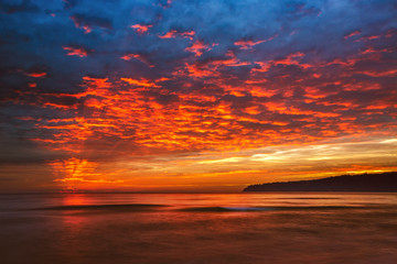 Sea sunrise with dramatic clouds