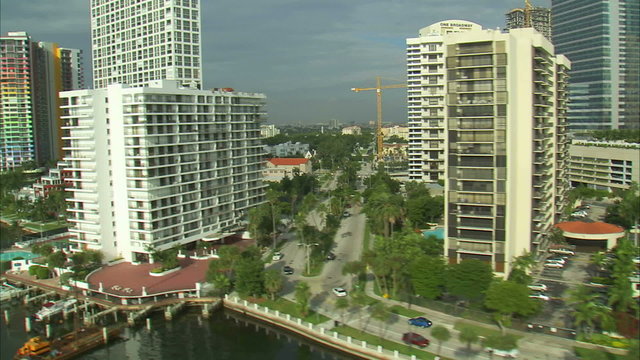 Flying by apartments and hotels in Miami.