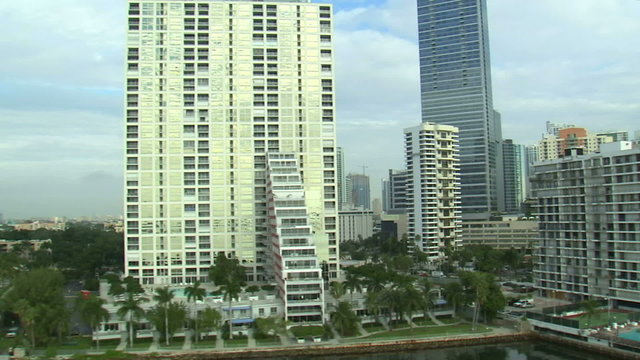 Flying by hotels and apartments in Miami.