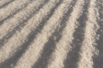 Snow on slate roof texture.