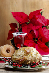 Baked pork with dried apricots on christmas table