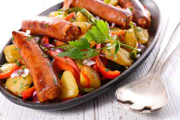 fried spicy sausage with vegetables