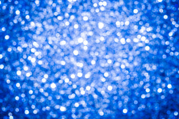 Abstract bokeh. Blurry blue shiny lights background.