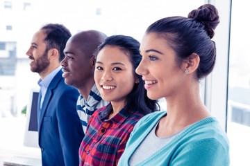 Portrait of Asian businesswoman with colleagues