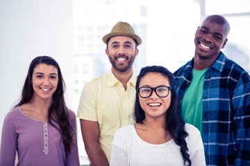 Obraz premium Portrait of businesswoman standing with team