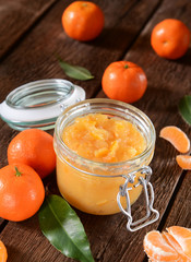 tangerine jam in glass jar