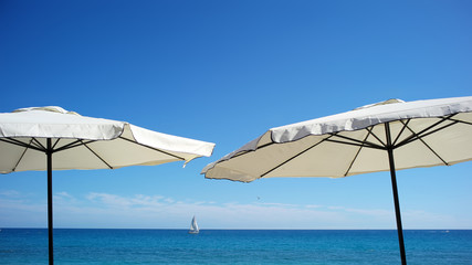 Beach umbrellas at seashore