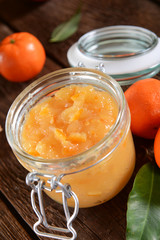 tangerine jam in glass jar
