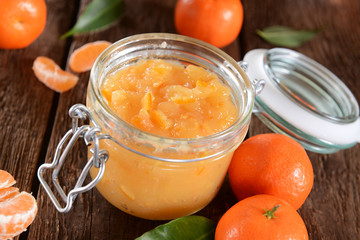 tangerine jam in glass jar