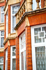 Fototapeta na wymiar in europe london old red brick wall and window