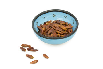 hot red peppers spice in ceramic bowl