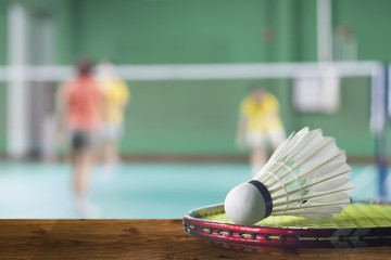 badminton - badminton courts with players competing