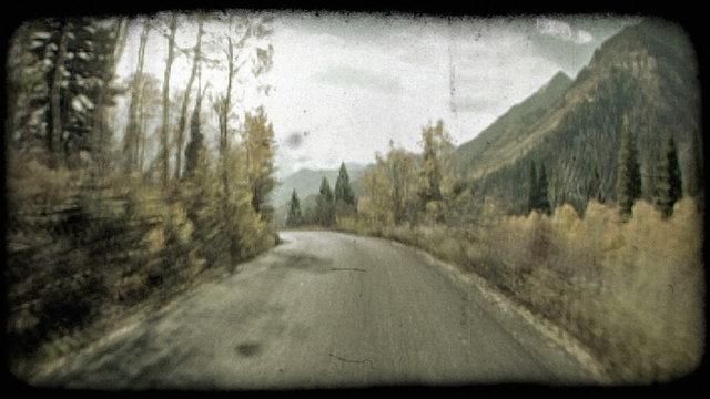 View from car on road 1. Vintage stylized video clip.