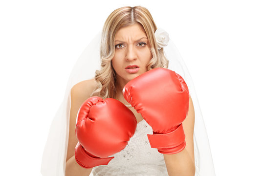 Angry bride with red boxing gloves