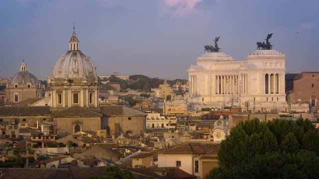 Still footage of the Sant'Andrea della Valle in front of the Altare della Patria