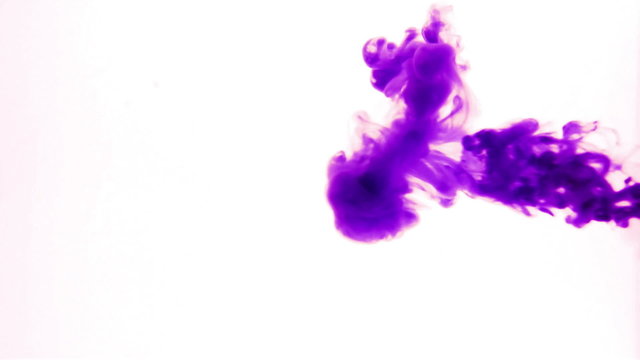 Pink ink in water.Creative slow motion. On a white background. 
