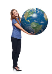 Woman in full length holding earth globe