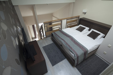 bedroom in duplex apartment selective focus