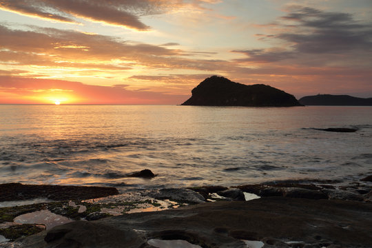 Summer sunrise views across to Lion island, Australia © Leah-Anne Thompson