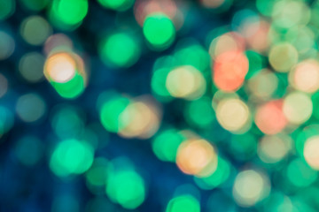 Obraz premium Closeup of the abstract green light bokeh