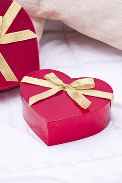 gift boxes with heart shape in the bedroom