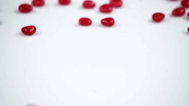 Red heart candies dropped.