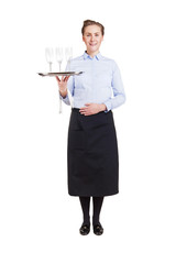 Woman in waiter uniform holding tray with glasses, smiling, isol