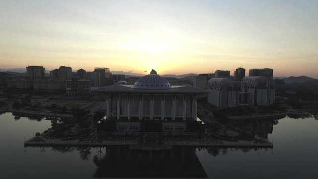 Aerial footage of Sultan Mizan Zainal Abidin mosque also known as the Iron Mosque or Masjid Besi, and the Palace of Justice, Court of Malaysia  taken during sunrise