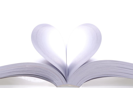 Open book pages into a heart shape.On white background. (Very light style pictures)