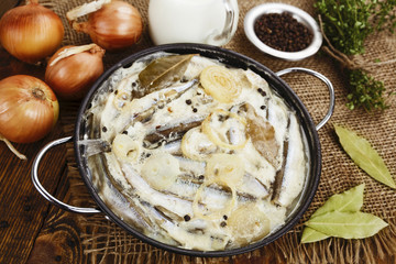 Capelin stewed in milk