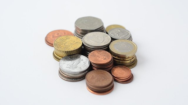 Money on a white background, coins.