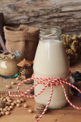 Soy milk with soybean seed.
