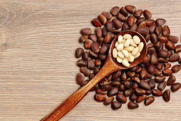 Pine nuts in a spoon