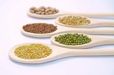 Seeds on wooden spoon