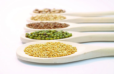 Seeds on wooden spoon