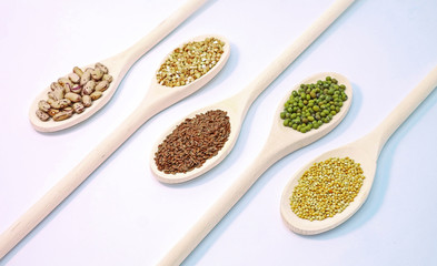 Seeds on wooden spoon