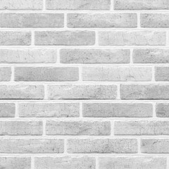 White brick stone wall seamless background and texture