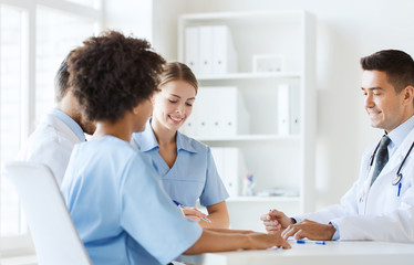 Fototapeta premium group of happy doctors meeting at hospital office