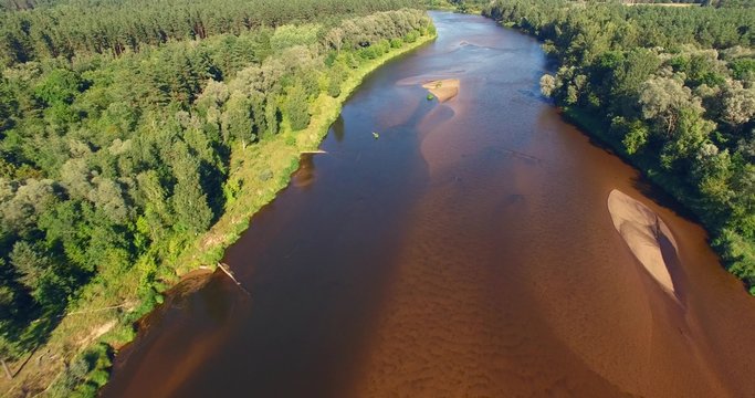 4K - Flight over the forest river