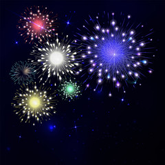 Colorful fireworks on black background. Night sky with stars and